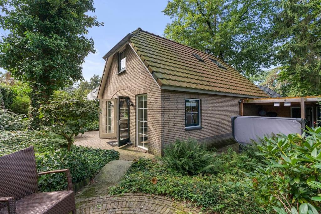 Luxe vakantiehuis in het bos met jacuzzi en sauna Lunteren Buitenkant foto